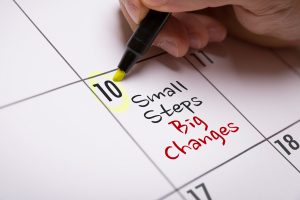 Calendar with writing 'small steps big changes'