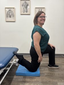 Christine Campbell, Physiotherapist, performing couch stretch