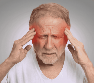 Man holding his head in pain