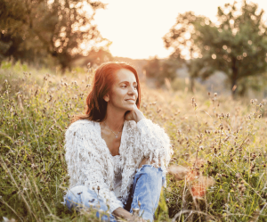 Women sitting in field 
